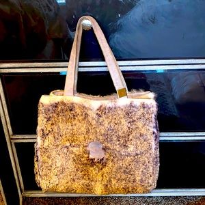 VINTAGE CHANEL fur bag in great shape. It’s beautiful.